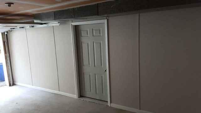 <p>An exterior door was placed to complete the basement. The homeowners were extremely happy with their new space!</p>