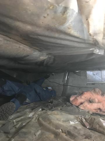 Old fiberglass insulation in crawl space