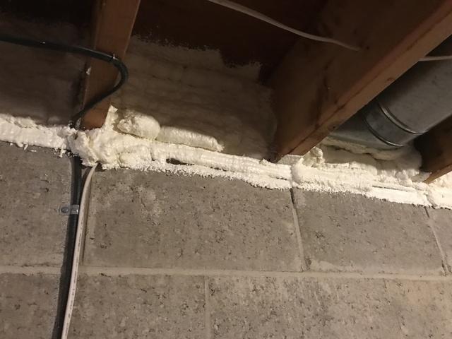 Spray foam rim joist to seal and insulate