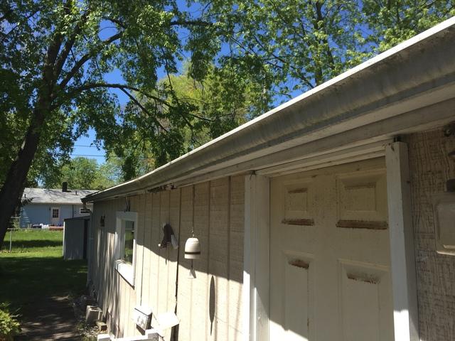 Old Gutter System and Roof on Garage
