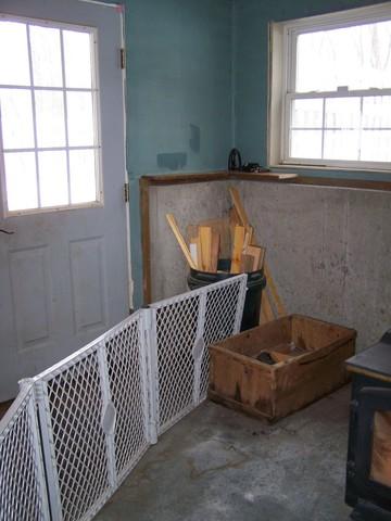 <p>The basement of this home in East Hampton, CT had suffered from water damage, seen in the staining on the floor. We installed a trench drain at the bottom of the door, connected to our WaterGuard perimeter drainage system to pump water out of the basement. Our unique pipes sit on the footing of the floor and will not clog. The basement is now dry and will not suffer from any more water damage.</p>