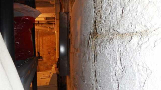 Crumbling Wall in Basement