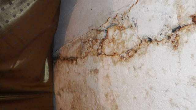 Closeup of Crumbling, Cracked Wall