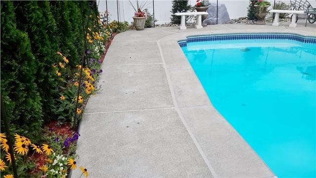 PolyLevel raised the sinking slabs around the entire pool area.