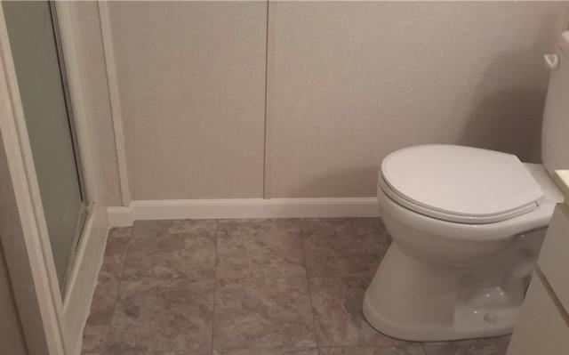 Bathroom After Waterproofind, Flooring and Wall Installation