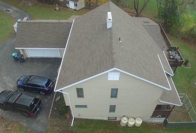 The style of roof and siding on this Bartonsville, Pennsylvania home really bring the entire property together