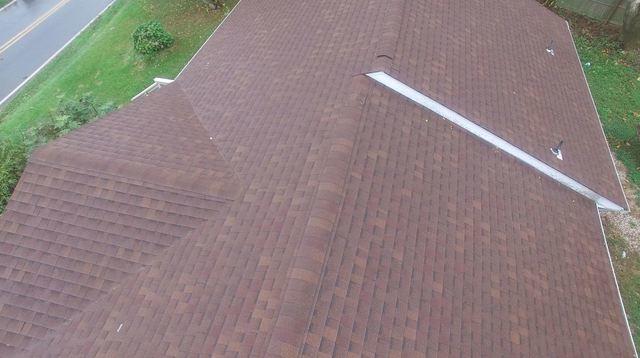 The peak of the roof is looking just as awesome as the rest of the roof, and there are no longer anymore unsightly patch spots, either