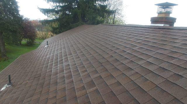 It was great to see some rain while we were at this job taking pictures, as we got to see the new roof at work