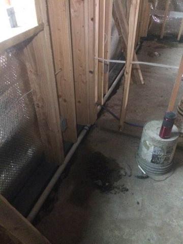 Laying down drain pipe