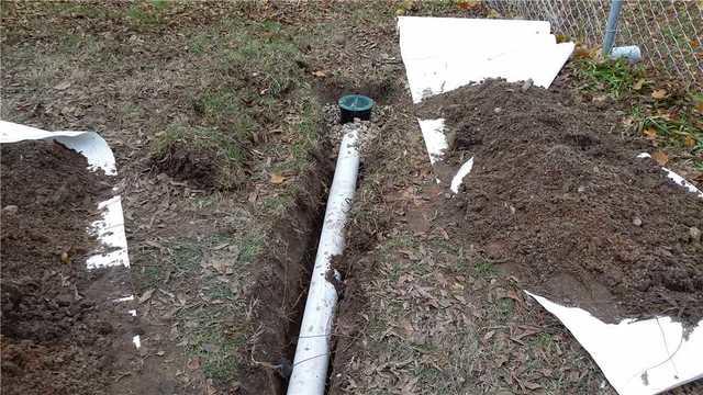 Lawnscape Outlet Allows Discharge Line Burial