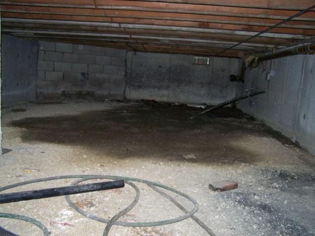 <p>The base of the foundation and walls in this crawlspace was leaking. To fix this, we installed our patented WaterGuard system. WaterGuard is a drainage channel engineered specifically to solve basement water problems effectively without worry of clogging from soil beneath the basement floor. The WaterGuard Drainage System intercepts water at the perimeter of the basement and drains it to a basement sump pump.</p>