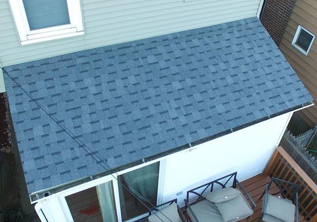 We completed this patio roof in Easton, and as you can see, these high quality, home lifetime warrantied shingles are looking superb and ready to protect this home from the elements
