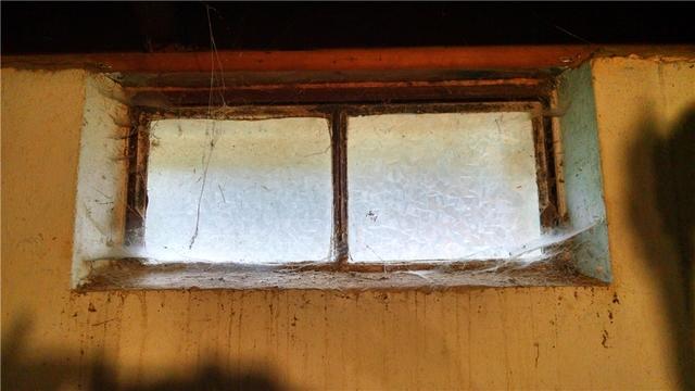 Old Rusty Basement Window