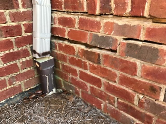 This crack was spotted on the left side of the porch, with about an inch of separation present.