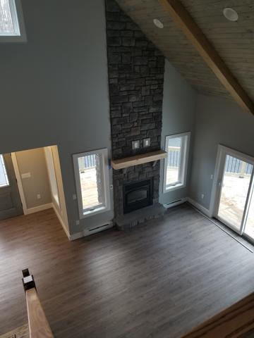 Loft looking down to fireplace.