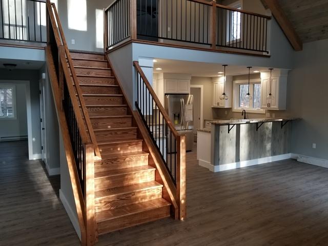 Custom handrails and staircase, view of kitchen.