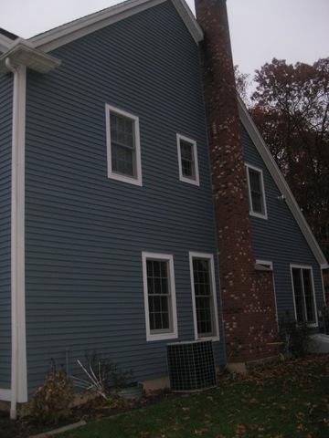 Fresh blue paint and white trim, side view