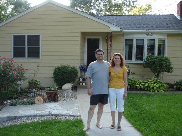 Homeowners with newly painted home