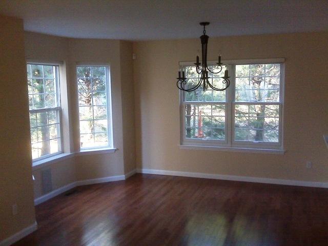 <p>The homeowner chose a soft yellow for these dining room walls. This really complements the existing natural light and wood floors.</p>