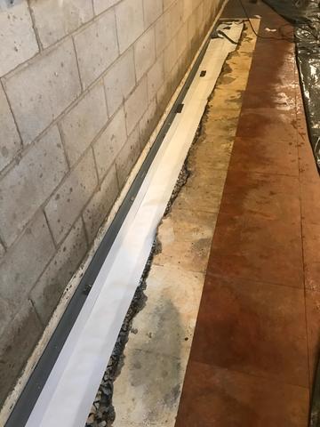 Installing WaterGuard Around Perimeter of Basement