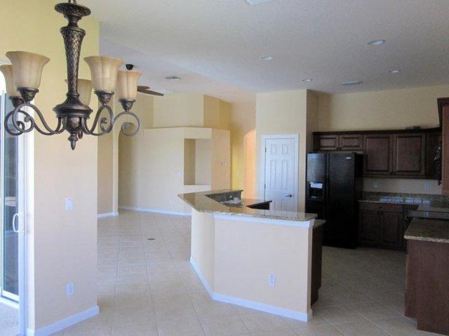 Newly painted living area and kitchen