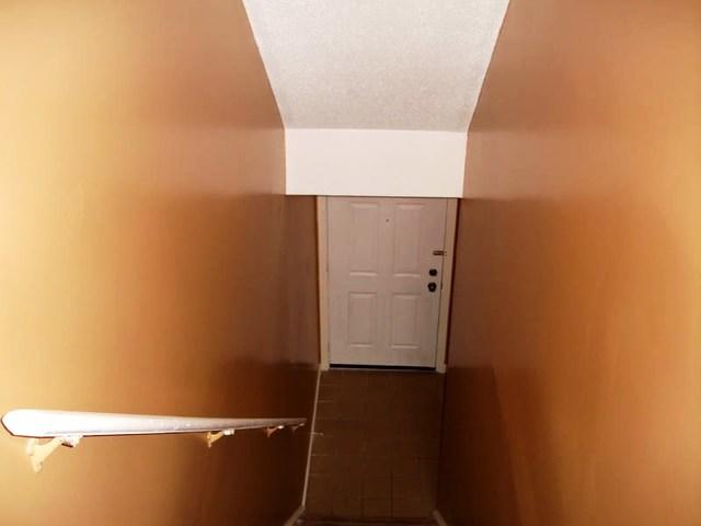 <p>Scholar spruced up the stairwell leading to the first floor by adding fresh paint in the beige/brown family.</p>