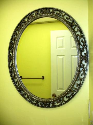 <p>This is another view of the brightly painted bathroom with installed hardware and accessories.</p>