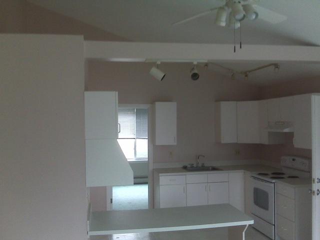 <p>Scholar brought new life to these kitchen walls by suggesting this light pink color.</p>