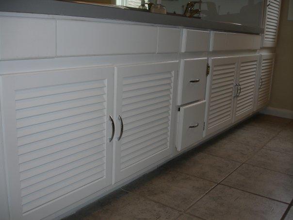 <p>These old cabinets were a retro feeling this homeowner wanted to keep in the home. Scholar helped them freshen them up by applying a clean, white painted finish.</p>