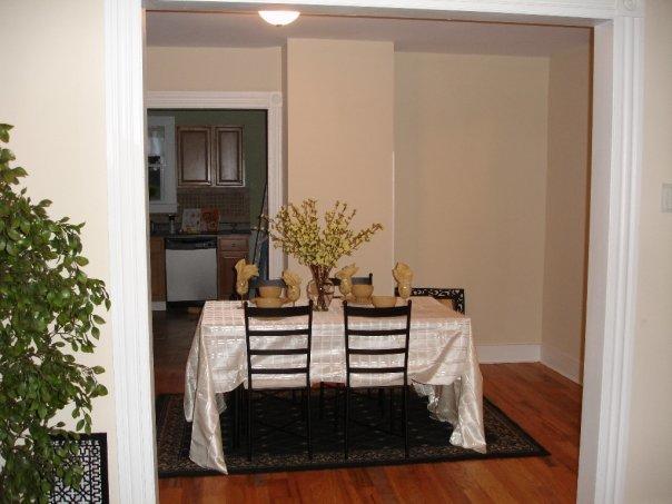 Beige dining room with white trim