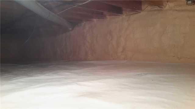 Our team removed the old insulation and replaced it will superior Polar Spray Foam insulation. It's moisture resistant and very efficient. The crawl space is now sealed, efficient and healthy.