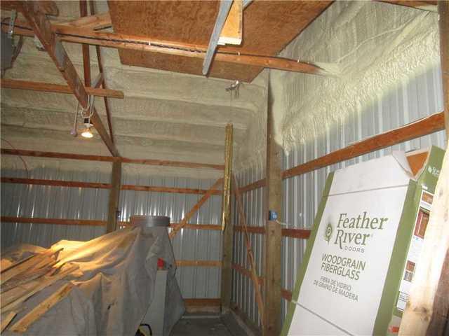 The far wall of the shop before insulation