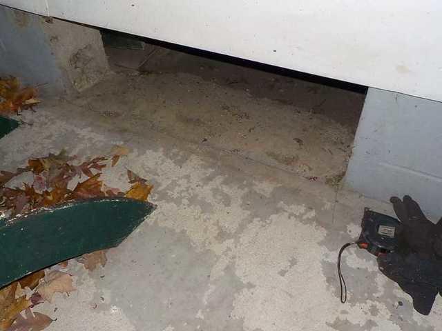 Tiny Entrance to Crawl Space in Higgins Lake