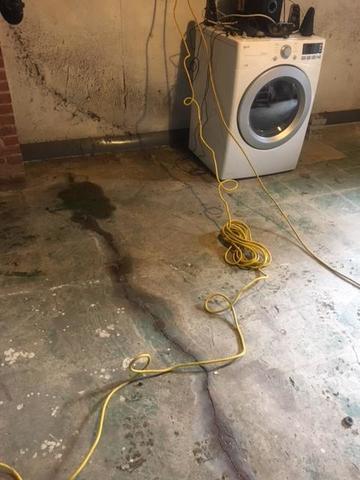 The homeowners quickly noticed a crack in the floor that was the cause for the water seepage.