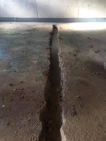 Service Technician Sam Bullock arrived at the home to take a look at the crack. The best solution for this problem was to install a 3 inch perforated pipe to help lead the water to the sump pump for proper drainage.