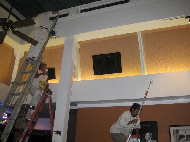Ladders used to reach elevated areas during painting