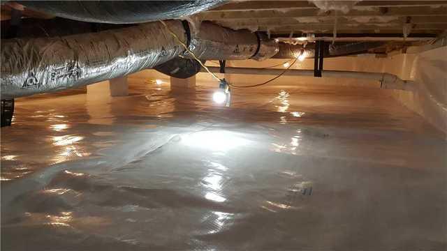 Overcoming Obstacles in a Crawl Space in Rehoboth Beach, DE