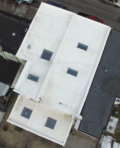 Pinnacle Exteriors took care of the roof and skylight installation here at this home in the Kensington neighborhood of Philadelphia, and Jessica, the homeowner, was very pleased with the results