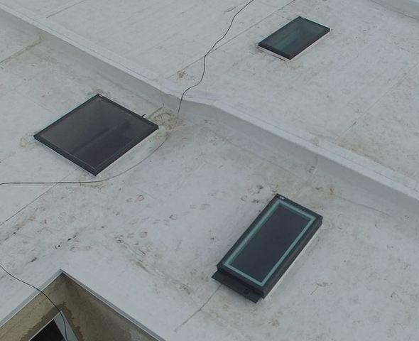 Pinnacle Exteriors provided a complete roof makeover on this rooftop in the Kensington neighborhood of Philadelphia, PA, installing a flat roof and 6 skylights throughout the differing levels of the roof