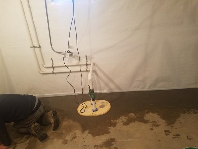 Concrete being put down to finish off WaterGuard System.