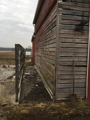 Side view & one area of the front of the corn crib.