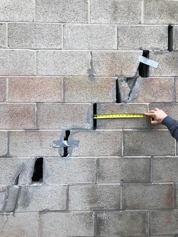 The length of this crack ran down nearly the entire wall.