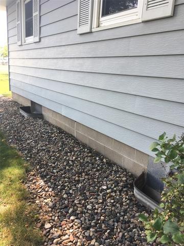 Signs of wall movement can be visible from the outside foundation.