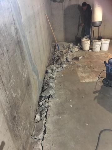 Concrete is broken up and ready to be removed