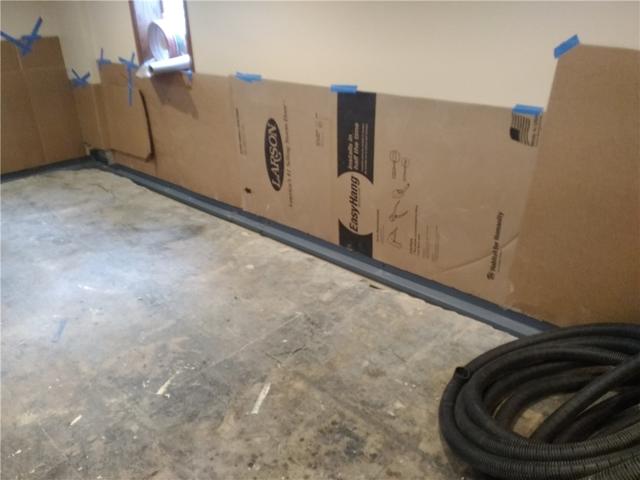 Installing WaterGuard drainage system