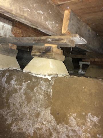 We see this a lot in crawlspaces. stacking wood is not a good way to support your home. They are unstable and will just rot out like the rest of the posts did.