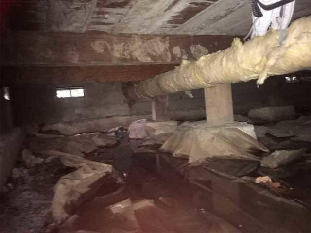 The water in the crawlspace evaporates up and into the home by a process known as the stack effect. This brings wet moist through the crawlspace and into the house.