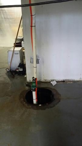 This was the original sump pump that this Cheshire home had. Clearly it was insufficient and was the cause for the water issues.