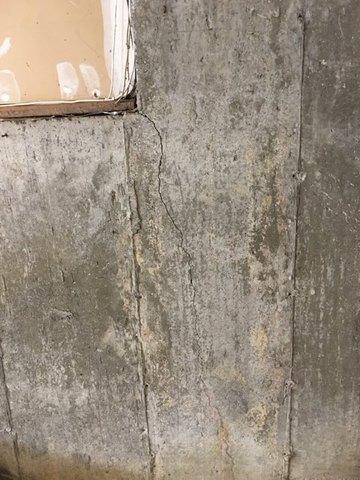 <p>This crack in the wall may look small, but it would let a lot of air and moisture into the basement.</p>