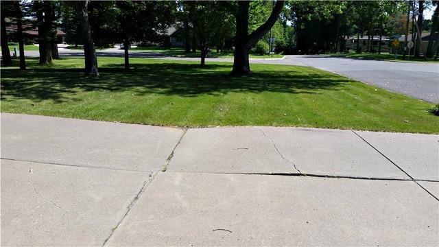 Sunken Slab of Concrete on Driveway